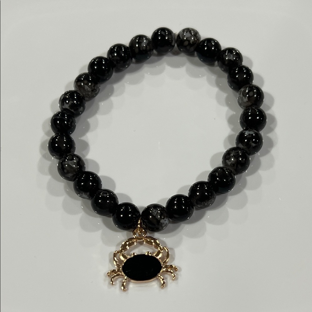 Black Beaded Bracelet with Gold Crab Charm